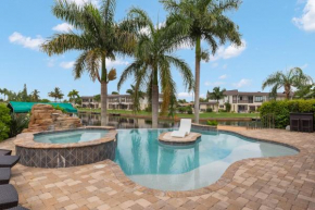 Stunning Waterfront Villa in Cape Coral with Lagoon Style Pool Spa and Boat Lift